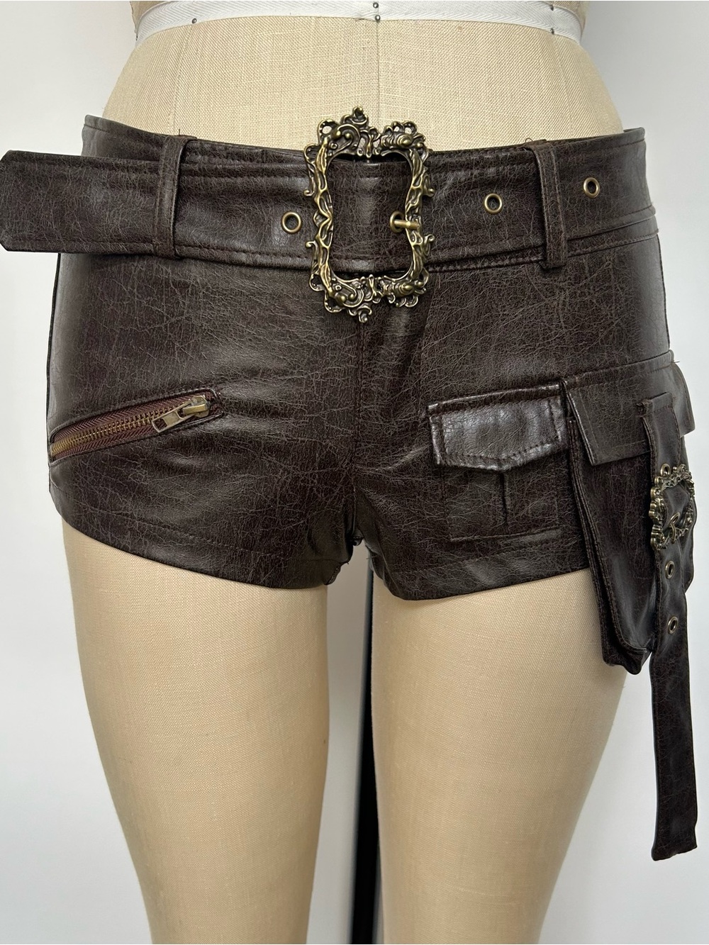 Vintage-Inspired Dark Brown Faux Leather Utility Shorts with Decorative Buckle